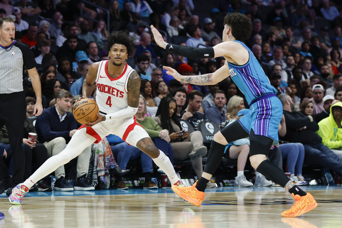 Rockets guard Jalen Green (4) shoots against Charlotte Hornets guard LaMelo Ball (1) during the second half at Spectrum Center.